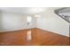 Spacious dining area with hardwood floors and a chandelier at 3069 Buttonwood Ln, Clayton, NC 27520