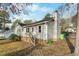 Ranch home's exterior with wooden steps and landscaping at 312 Burkwood Ln, Raleigh, NC 27609