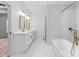 Bathroom with double vanity and hexagon tile floor at 4017 Mebane Oaks Rd, Mebane, NC 27302