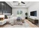 Spacious main bedroom with dark accent wall and large window at 4017 Mebane Oaks Rd, Mebane, NC 27302