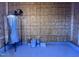 Unfinished basement with water heater and paint cans at 4553 Dedication Dr, Raleigh, NC 27610