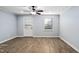 Living room with hardwood floors and neutral walls at 6345 New Market Way, Raleigh, NC 27615