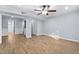 Living room with hardwood floors and neutral walls at 6345 New Market Way, Raleigh, NC 27615