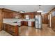 Kitchen with wood cabinets and tile flooring at 6400 Malibu Dr, Raleigh, NC 27603