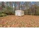 Small metal storage shed in the backyard at 6400 Malibu Dr, Raleigh, NC 27603