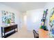 Home office featuring a desk, shelving, and bright artwork at 301 Cherry Laurel Dr, Sanford, NC 27332