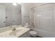Clean bathroom with a bathtub, shower, and single sink vanity at 524 Glenolden Ct, Cary, NC 27513