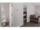 Clean bathroom with toilet and view of bedroom at 524 Glenolden Ct, Cary, NC 27513