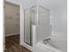 Bathroom with a shower and bathtub, and access to a walk-in closet at 524 Glenolden Ct, Cary, NC 27513