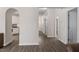Hallway with access to bedrooms and kitchen at 524 Glenolden Ct, Cary, NC 27513