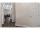Bright hallway with dark wood flooring and access to living area at 524 Glenolden Ct, Cary, NC 27513