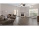 Spacious living room with fireplace and hardwood floors at 524 Glenolden Ct, Cary, NC 27513