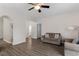 Living room with hardwood floors and access to hallway at 524 Glenolden Ct, Cary, NC 27513