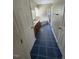 Main bathroom with double vanity, bathtub, and tiled floor at 6101 Valentine St, Zebulon, NC 27597