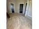 Large bedroom with carpet, access to bathroom and closet at 6101 Valentine St, Zebulon, NC 27597