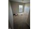 Simple bedroom with carpet flooring and a window at 6101 Valentine St, Zebulon, NC 27597