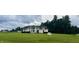 House exterior showcasing a large, ranch style home with a spacious lawn at 6101 Valentine St, Zebulon, NC 27597
