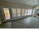 Sunroom with tiled floors and access to a deck at 6101 Valentine St, Zebulon, NC 27597
