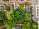 Aerial view showing home's location near other houses and green spaces at 810 Brooklyn St, Raleigh, NC 27605