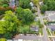 Large residential lot with surrounding trees and homes at 810 Brooklyn St, Raleigh, NC 27605