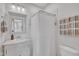 Clean bathroom with white vanity and shower at 810 Brooklyn St, Raleigh, NC 27605