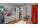 Second bedroom with eclectic decor and hardwood floors at 810 Brooklyn St, Raleigh, NC 27605