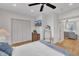 Bedroom with queen bed and access to another room at 810 Brooklyn St, Raleigh, NC 27605