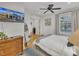 Bedroom with TV, dresser, and hardwood floors at 810 Brooklyn St, Raleigh, NC 27605