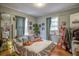 Cozy bedroom with hardwood floors and unique decor at 810 Brooklyn St, Raleigh, NC 27605