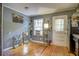 Small dining area with wood floors and gray walls at 810 Brooklyn St, Raleigh, NC 27605