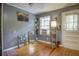 Bright dining area with hardwood floors and a window at 810 Brooklyn St, Raleigh, NC 27605