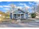 Newly painted blue bungalow with covered porch at 810 Brooklyn St, Raleigh, NC 27605
