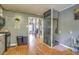 Kitchen with chalkboard accent wall and wood floors at 810 Brooklyn St, Raleigh, NC 27605