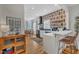 Modern kitchen with white cabinets, patterned backsplash and breakfast bar at 810 Brooklyn St, Raleigh, NC 27605