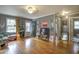 Bright living room with hardwood floors and eclectic decor at 810 Brooklyn St, Raleigh, NC 27605