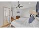 Relaxing main bedroom featuring a king bed, bathroom access, and a home office at 810 Brooklyn St, Raleigh, NC 27605