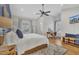 Main bedroom with hardwood floors, large windows, and built-in home office space at 810 Brooklyn St, Raleigh, NC 27605