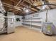 Unfinished basement with HVAC and water heater at 191 Pine Lake Dr, Siler City, NC 27344
