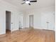 Spacious bedroom with hardwood floors and multiple closets at 191 Pine Lake Dr, Siler City, NC 27344