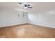 Hardwood floor bedroom with ceiling fan and lots of light at 191 Pine Lake Dr, Siler City, NC 27344
