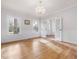 Bright dining room with hardwood floors and chandelier at 191 Pine Lake Dr, Siler City, NC 27344