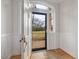 Open entryway with view of backyard and wood floors at 191 Pine Lake Dr, Siler City, NC 27344