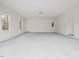 Spacious and bright garage with painted floor at 191 Pine Lake Dr, Siler City, NC 27344