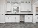 Modern kitchen with white cabinets and dark countertops at 191 Pine Lake Dr, Siler City, NC 27344