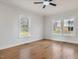 Bright office space with hardwood floors and multiple windows at 191 Pine Lake Dr, Siler City, NC 27344