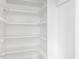 Bright white pantry with adjustable shelving, offering ample storage at 191 Pine Lake Dr, Siler City, NC 27344