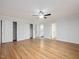 Spacious primary bedroom with hardwood floors and ample closet space at 191 Pine Lake Dr, Siler City, NC 27344
