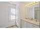 Bathroom with double vanity and shower at 204 Barbour Rd, Smithfield, NC 27577