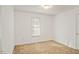 Bright bedroom with neutral carpet at 204 Barbour Rd, Smithfield, NC 27577
