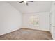Bright bedroom with vaulted ceiling, carpet, and window at 204 Barbour Rd, Smithfield, NC 27577